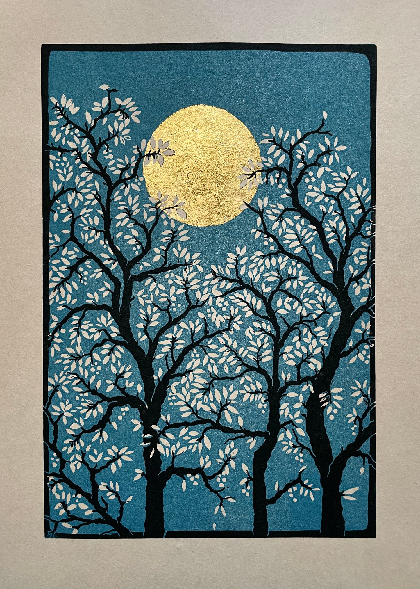 Moon Above The Trees, Two-Plate Linoprint in Blue with Gold Leaf Moon by Grace Gillespie